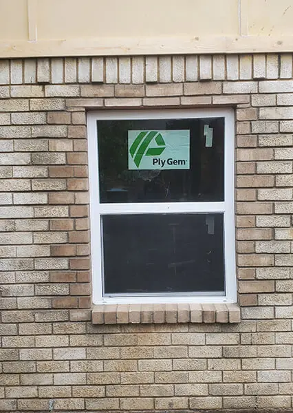 A window with a sign on it that says " mygreen ".